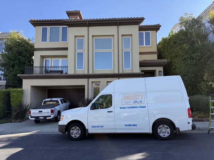 Breezy Air Services van at an Orange County residence